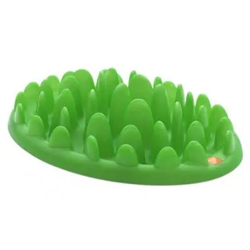 Comedero antiglotones para perros de color verde, con relieves que obligan a comer más despacio
